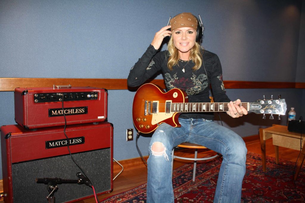 Anita Cochran with her Les Paul guitar and Matchless amp in the studio